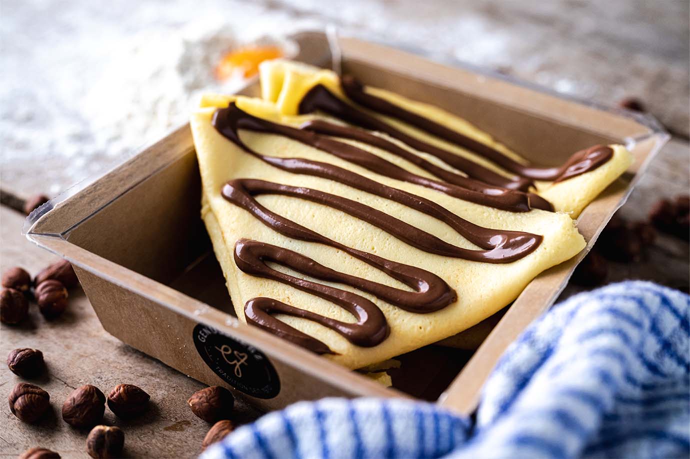 Genussherz Orangen-Crêpes mit Nuss-Nougat Crème in seiner Verpackung